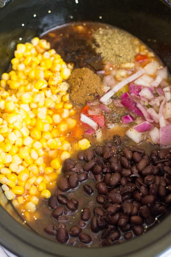 This Slow Cooker Mexican Quinoa Bake takes only 10 minutes of prep work and is made with quinoa and all your favorite Mexican ingredients for a thick, filling and delicious slow cooker weeknight meal!