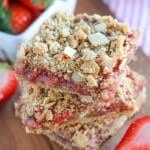 Whole Grain Strawberry Breakfast Bars ~ Delicious & Easy whole grain oat bars filled with strawberries and topped with an almond crumble! Perfect for Breakfast or a Sweet Treat!