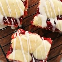 Cherry Pie Bars ~ Soft, flake crust flavored with Almond and stuffed with Cherry Pie Filling! Easier than pie but just as yummy!
