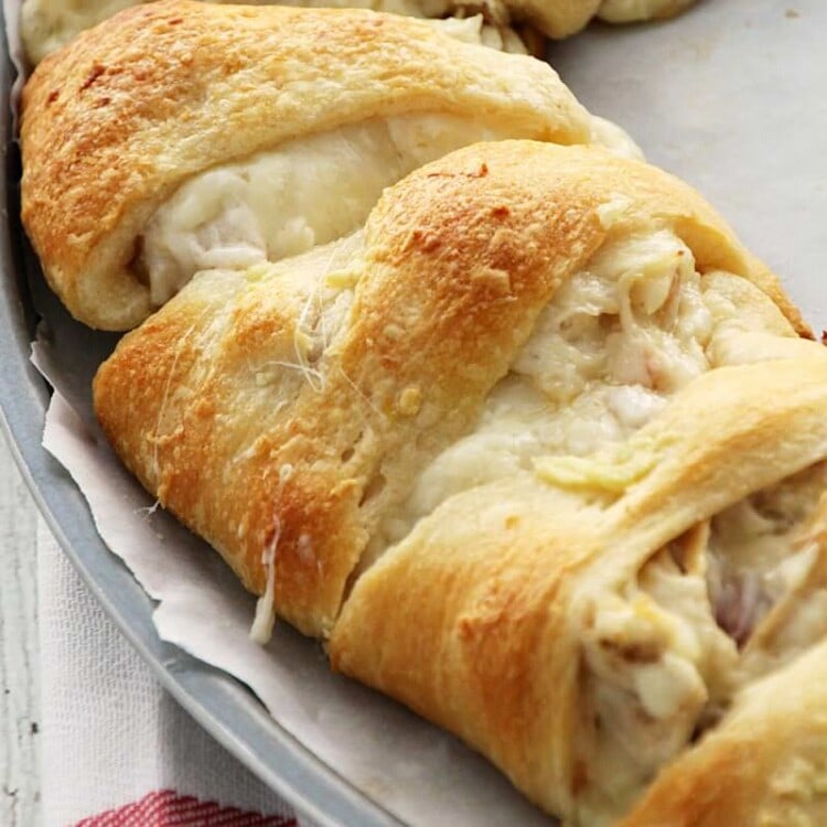Cordon Bleu Crescent Ring ~ Flaky Crescent Rolls Stuffed with Swiss Cheese, Ham, Chicken and Topped with Garlic Butter! Quick & Easy Dinner!