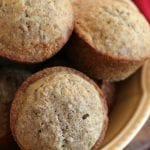 Gold bowl with a stack of bran muffins in it