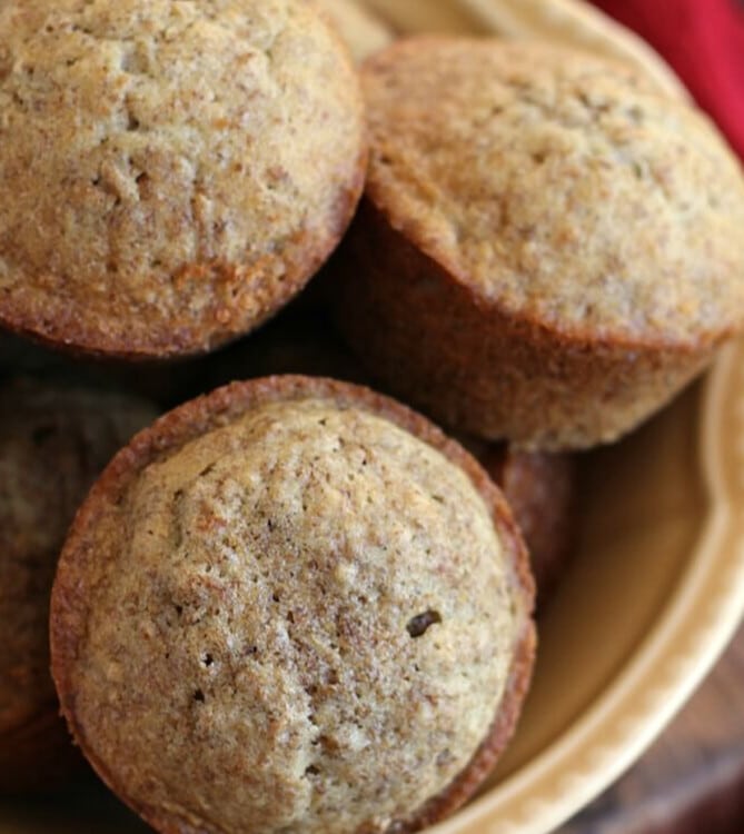 Gold bowl with a stack of bran muffins in it