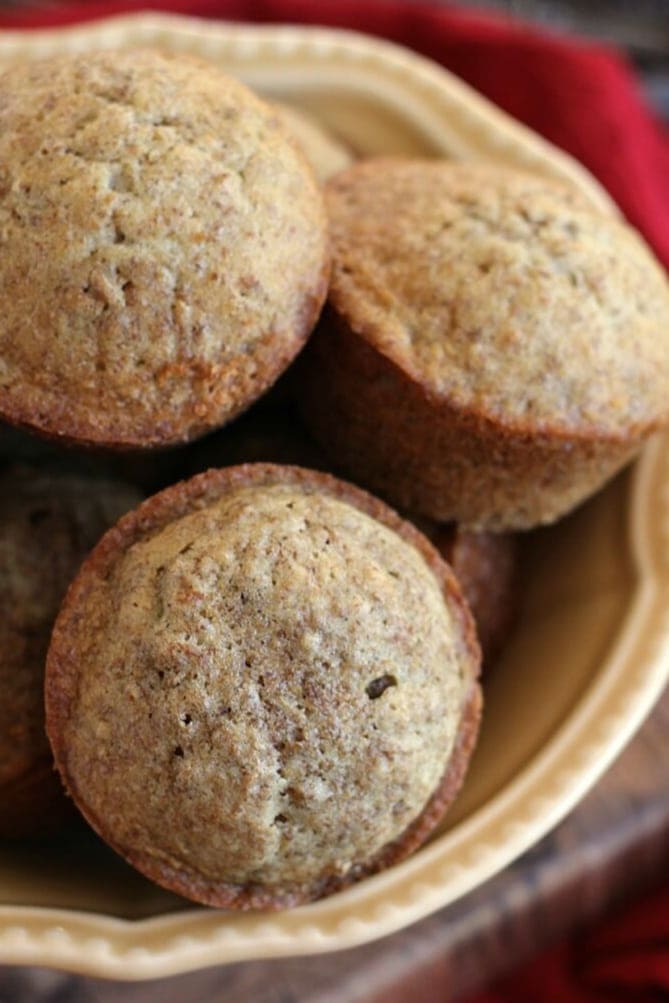 Gold bowl with a stack of bran muffins in it