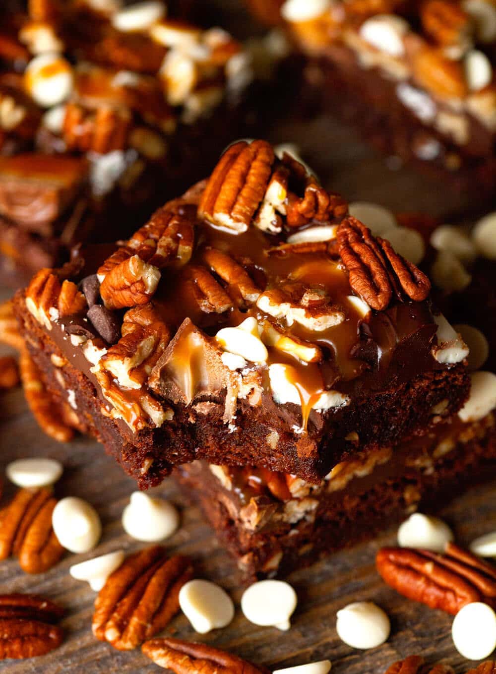 Stack of two turtle brownies with a bite out of the top one