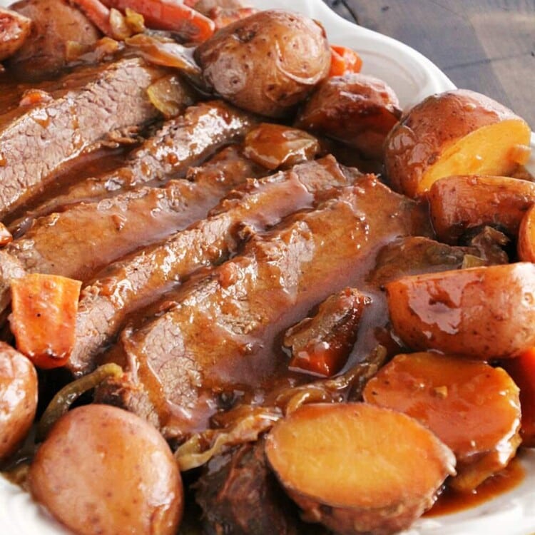 Crock Pot BBQ Brisket Recipe ~ Delicious, Slow Cooked Brisket with Onions, Carrots and Potatoes Smothered in a BBQ Sauce!