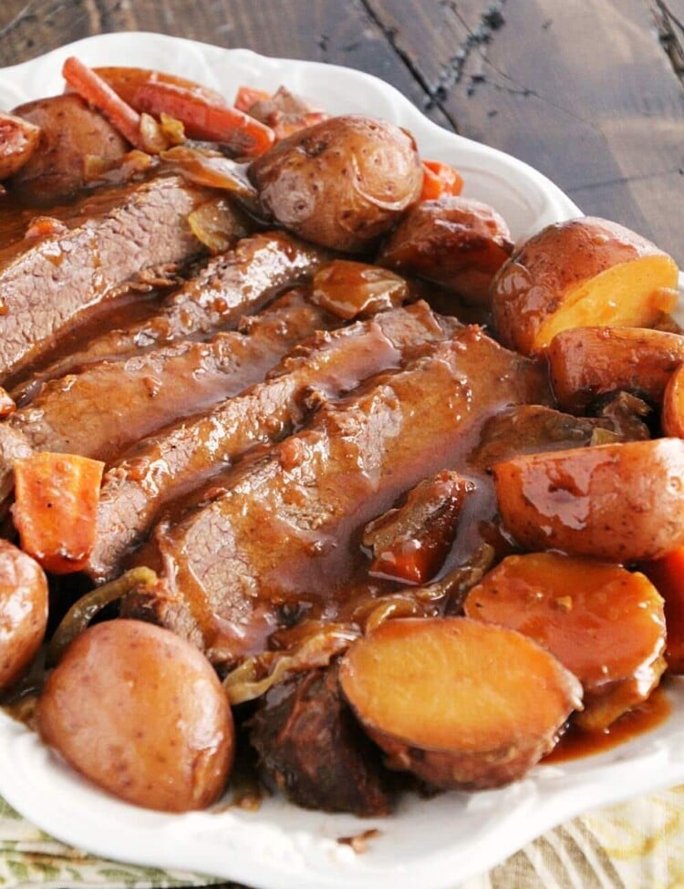 Crock Pot BBQ Brisket Recipe ~ Delicious, Slow Cooked Brisket with Onions, Carrots and Potatoes Smothered in a BBQ Sauce!