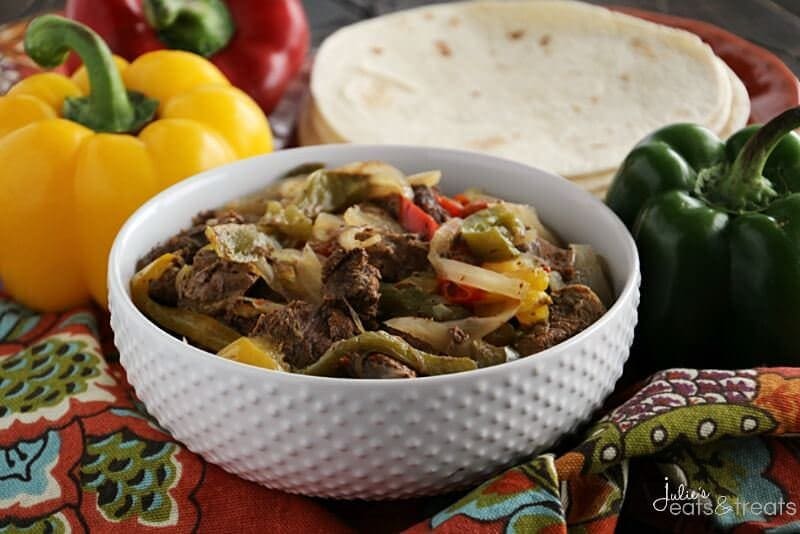 Crock Pot Steak Fajitas ~ Loaded with Steak, Red Peppers, Green Peppers, Yellow, Peppers, Onions and Spices! Piled High on a Tortilla Shell! The Perfect Quick, Easy Weeknight Recipe!