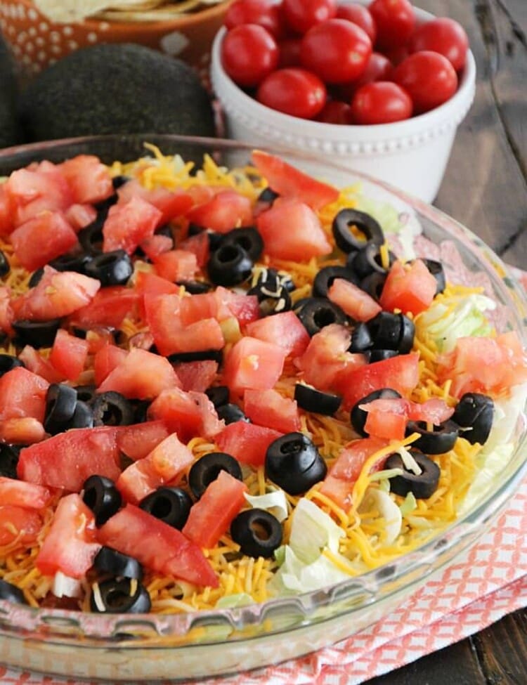 Loaded Guacamole Dip ~ Guacamole Piled High with Cheese, Salsa, Tomatoes, & Black Olives!