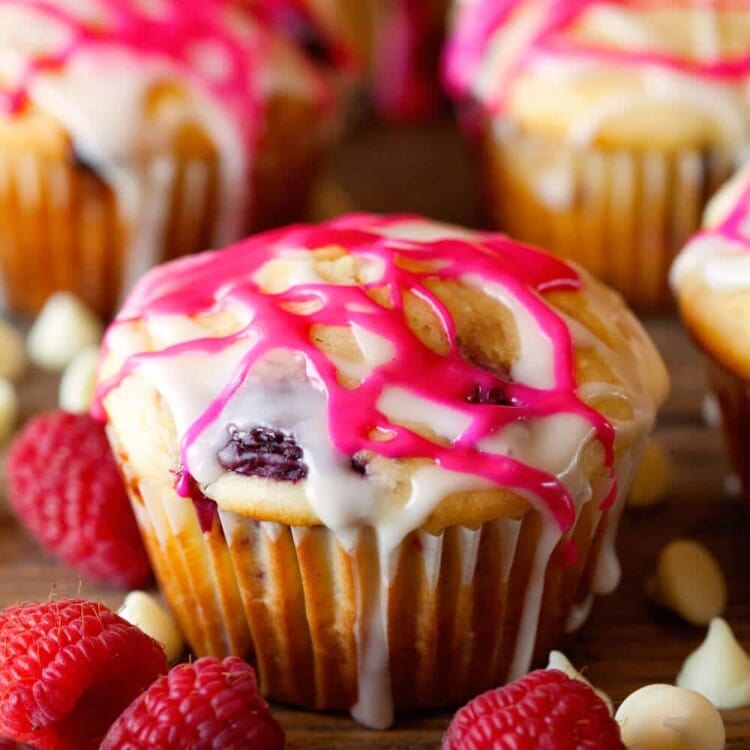 White Chocolate Chip Raspberry Muffins ~ Scrumptious Homemade Muffins studded with White Chocolate Chips, Juicy Raspberries and finished with a Sweet Glaze.