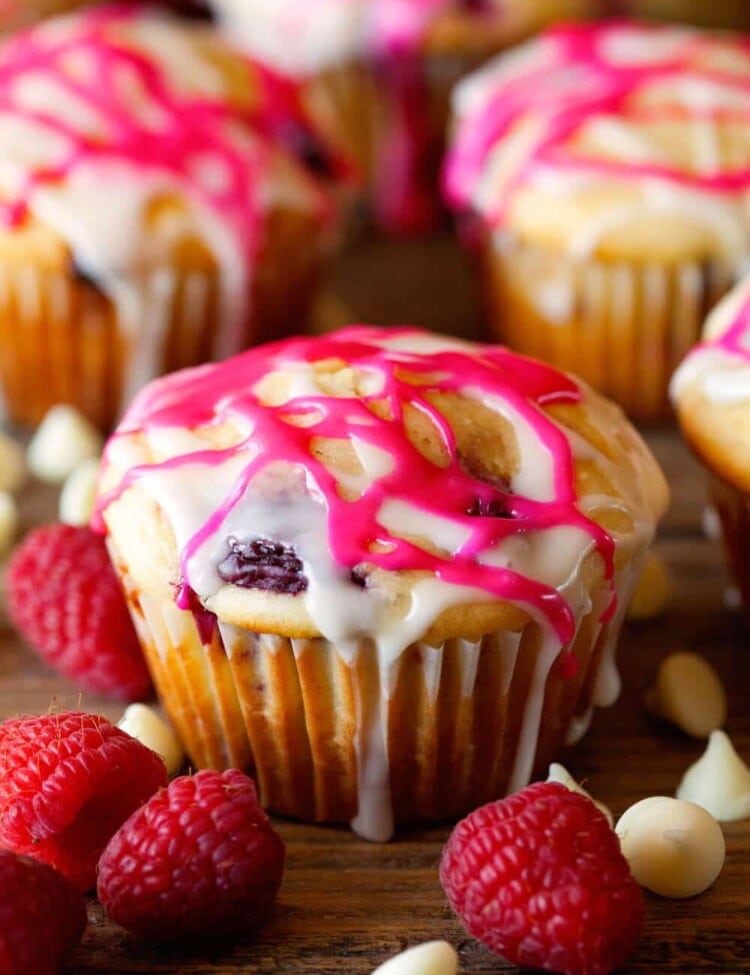 White Chocolate Chip Raspberry Muffins ~ Scrumptious Homemade Muffins studded with White Chocolate Chips, Juicy Raspberries and finished with a Sweet Glaze.