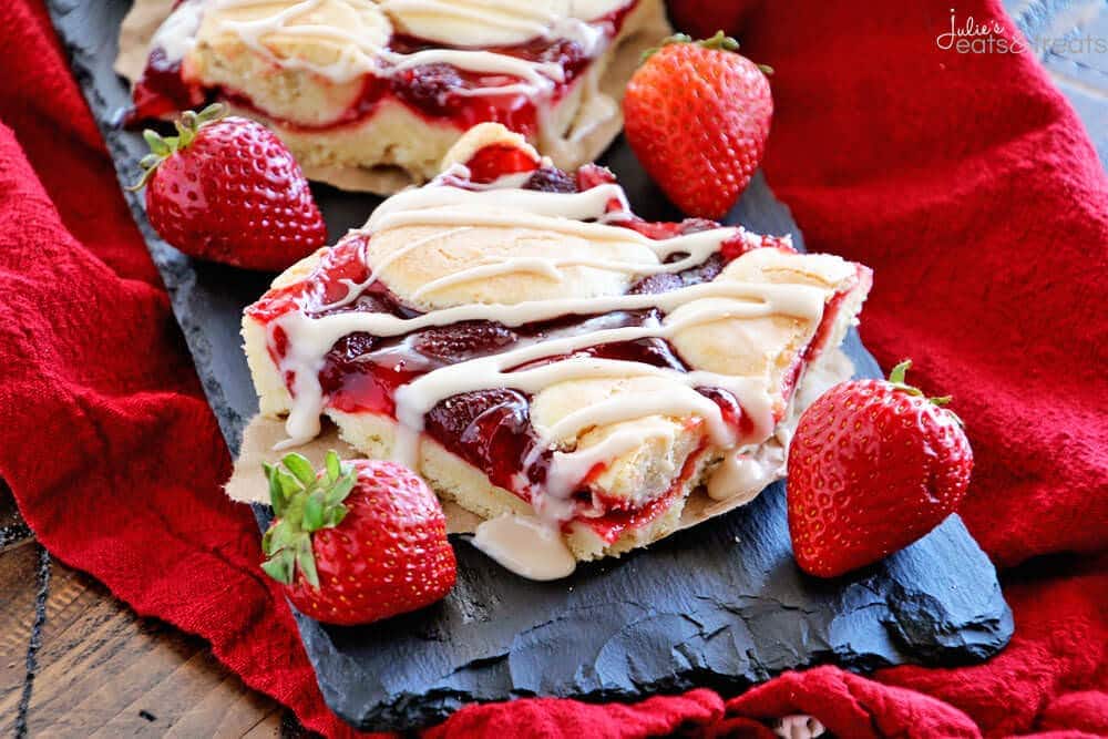 Strawberry Pie Bars ~ Quick and Easy Bars Stuffed with Strawberry Pie Filling in between a Soft and Delicious Almond Crust then Drizzled with Almond Icing!