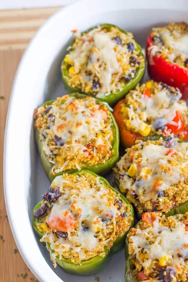 These Tex Mex Quinoa Stuffed Peppers are a healthy protein packed, delicious and easy weeknight meal for your family!