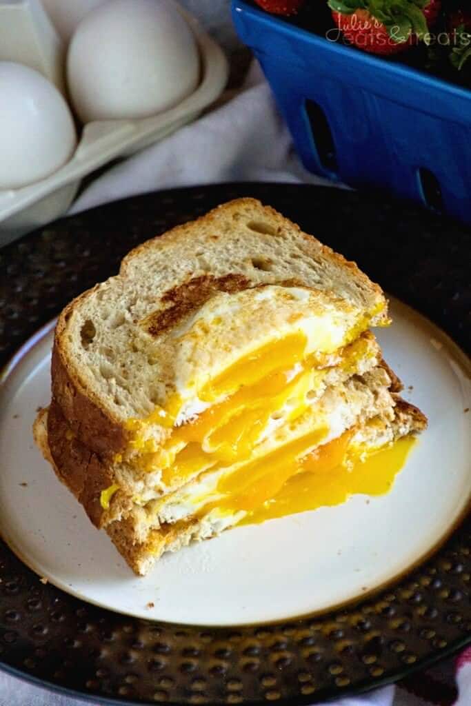 Cheesy Egg in a Hole ~ Delicious Breakfast Sandwich Recipe! Quick and Easy Eggs in a Piece of Toast with Cheese Sandwich Between them!