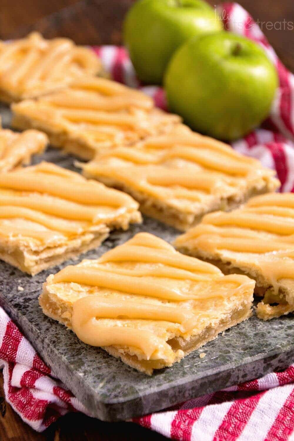 Apple Bar Recipe with Caramel Frosting ~ Soft, flaky crust stuffed with homemade apple pie filling and drizzled with caramel frosting!