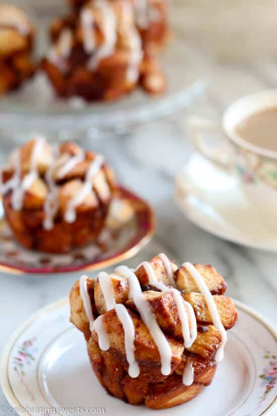 Cinnamon Roll Monkey Bread Muffins - Use cinnamon rolls for this tasty twist on monkey bread. Sweet, soft, filled with cinnamon, and topped with cream cheese icing.