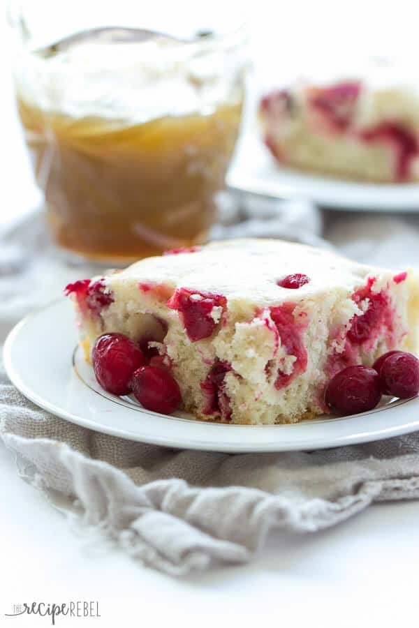 Cranberry Cake with Caramel Sauce Recipe ~ Moist vanilla cake filled with cranberries and covered in a warm caramel sauce! An elegant holiday dessert that is super easy!