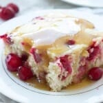 Cranberry Cake with Caramel Sauce Recipe ~ Moist vanilla cake filled with cranberries and covered in a warm caramel sauce! An elegant holiday dessert that is super easy!