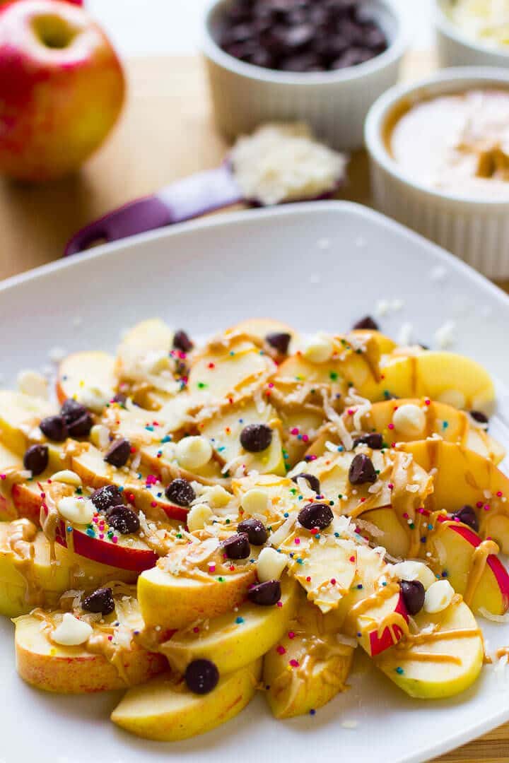 Loaded Apple Nachos Recipe ~ Easy to make, delicious and crisp and a great quick dessert! Loaded with Peanut Butter, White Chocolate, Chocolate Chips & Coconut!