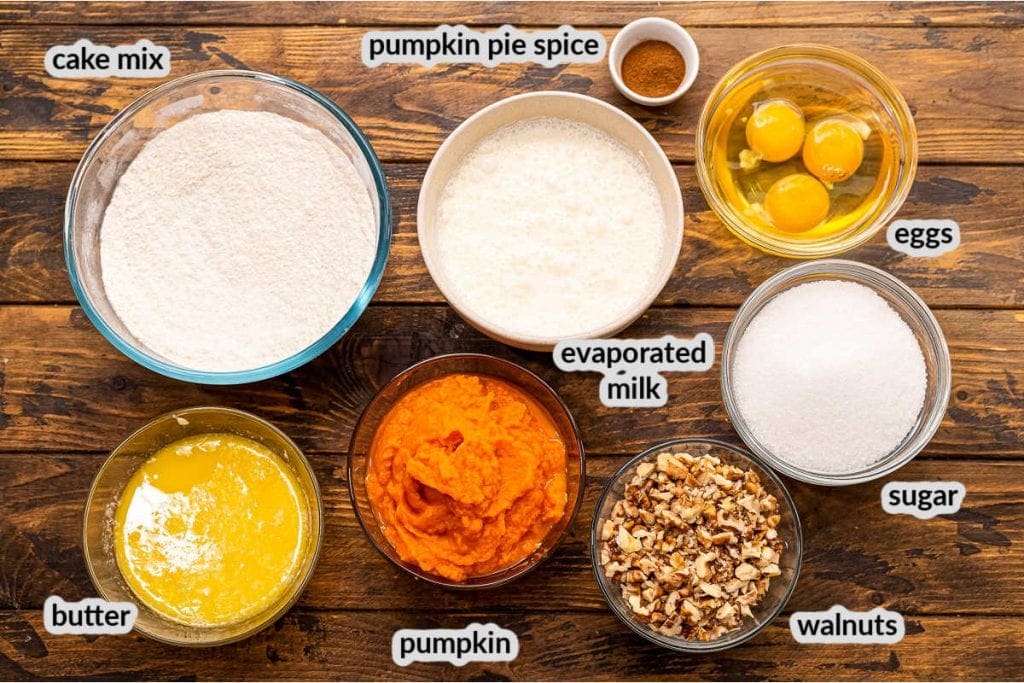 Overhead view of Pumpkin Dump Cake Ingredients in bowls.