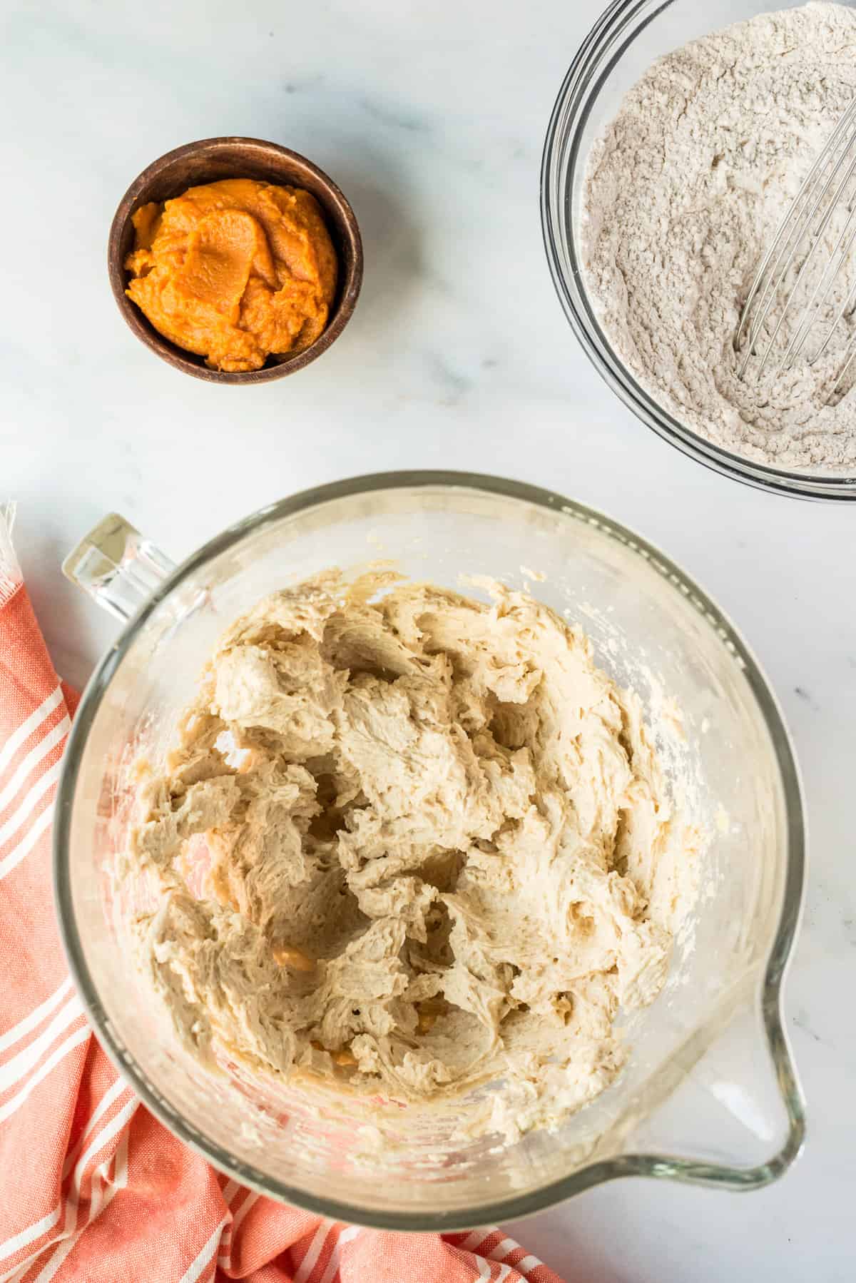 Batter creamed together in glass bowl