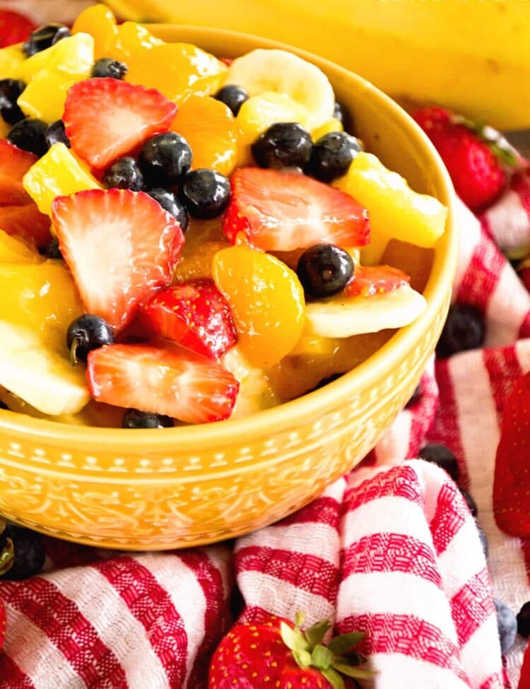 Sunshine Fruit Salad ~ Delicious, Easy Fruit Salad Recipe filled with Strawberries, Pineapples, Bananas, Blueberries and Mandarin Oranges! Perfect as a Side Dish or for Brunch!