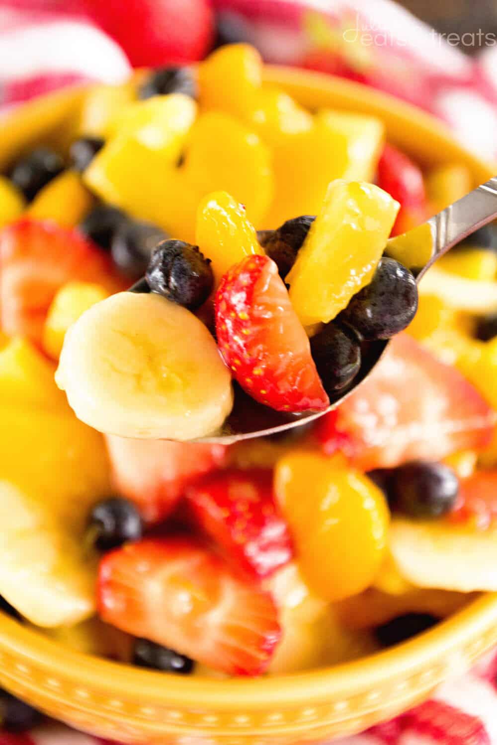 Sunshine Fruit Salad ~ Delicious, Easy Fruit Salad Recipe filled with Strawberries, Pineapples, Bananas, Blueberries and Mandarin Oranges! Perfect as a Side Dish or for Brunch!