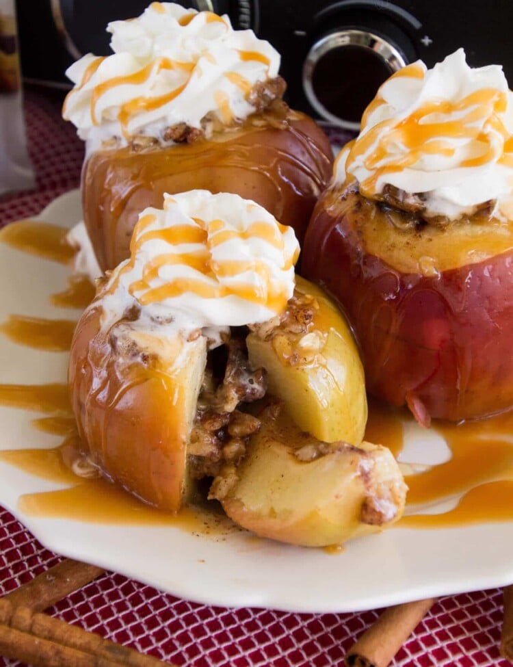 Light Crock Pot Baked Apples Recipe ~ Delicious, Apples Stuffed with Oatmeal, Brown Sugar and Walnuts then Baked to Perfection in the Slow Cooker! Then Drizzle them with Caramel!