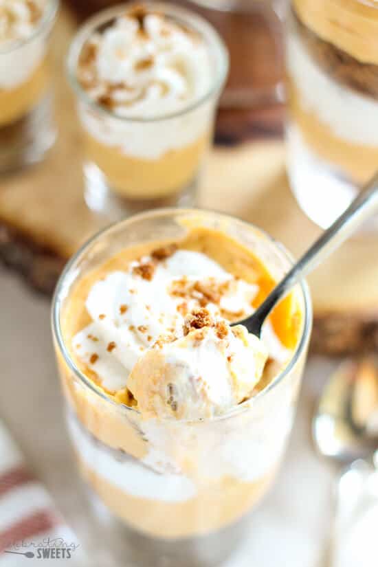 Pumpkin Cream Pie Trifles Dessert - Pumpkin cream cheese filling layered with whipped cream and crushed gingersnap cookies. Similar to pumpkin pie and pumpkin cheesecake, you will love this no-bake dessert perfect for Thanksgiving!