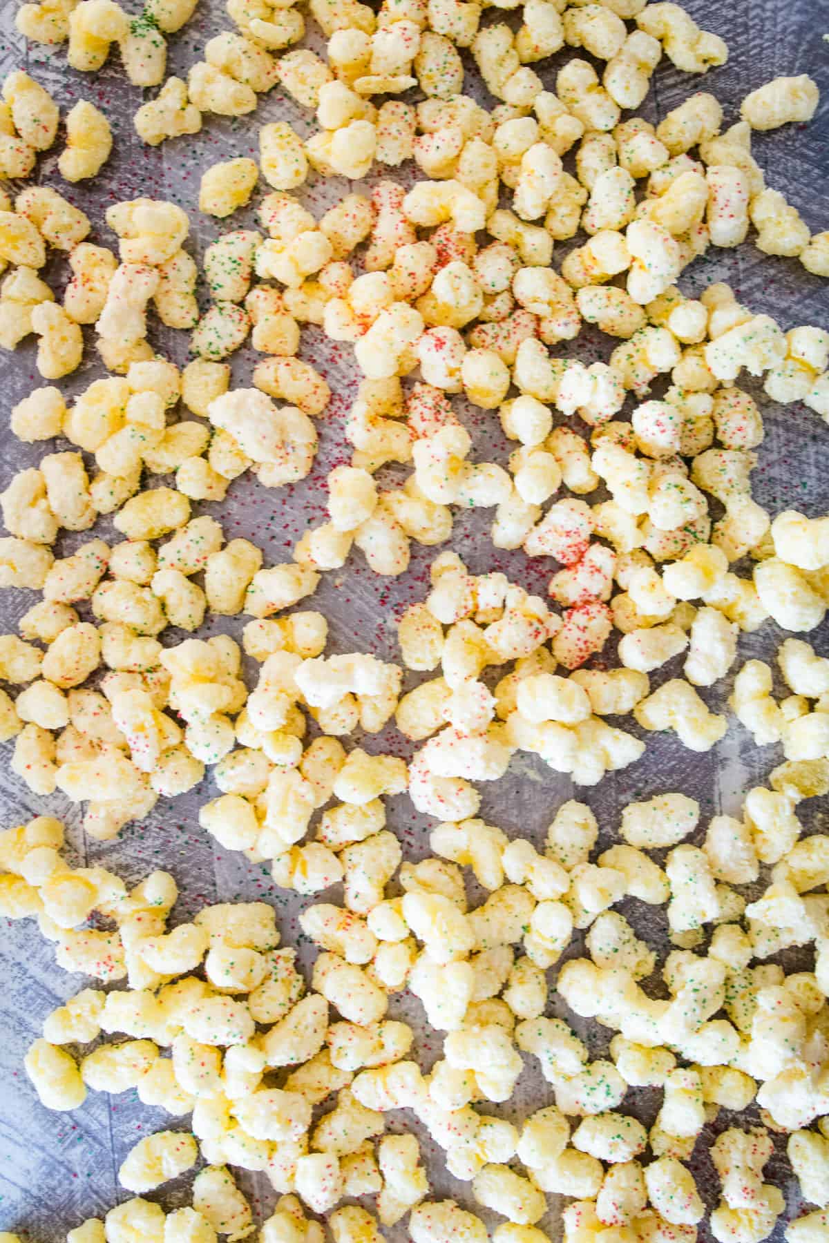 Overhead image of White Chocolate Puffcorn on wax paper