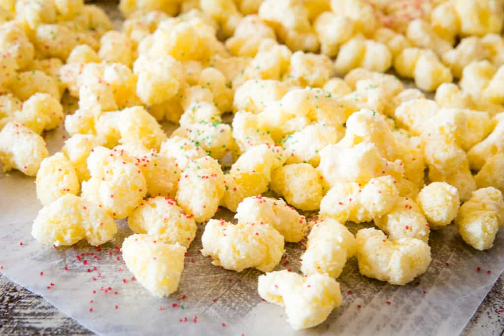 Wax paper with White Chocolate Puffcorn drying on it