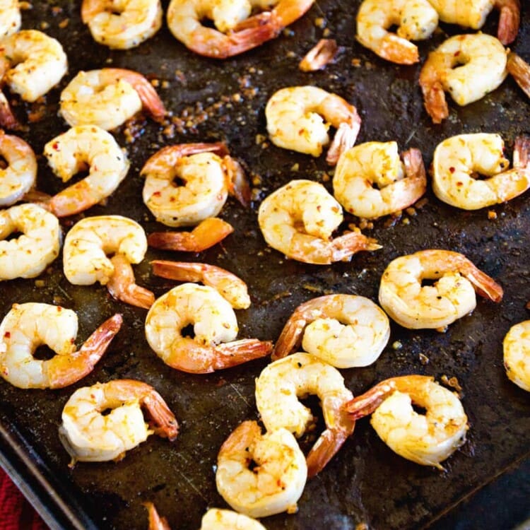 A baking sheet of cajun broiled shrimp