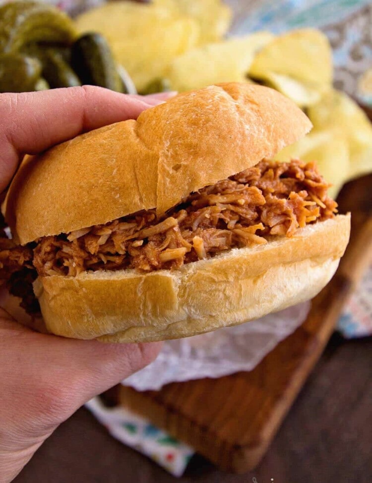 Crock Pot Smokey BBQ Shredded Chicken Sandwiches~ Easy, Shredded Chicken Sandwiches in Your Slow Cooker! Tender, Moist and Delicious Flavored with Liquid Smoke and Smothered in Barbecue Sauce!