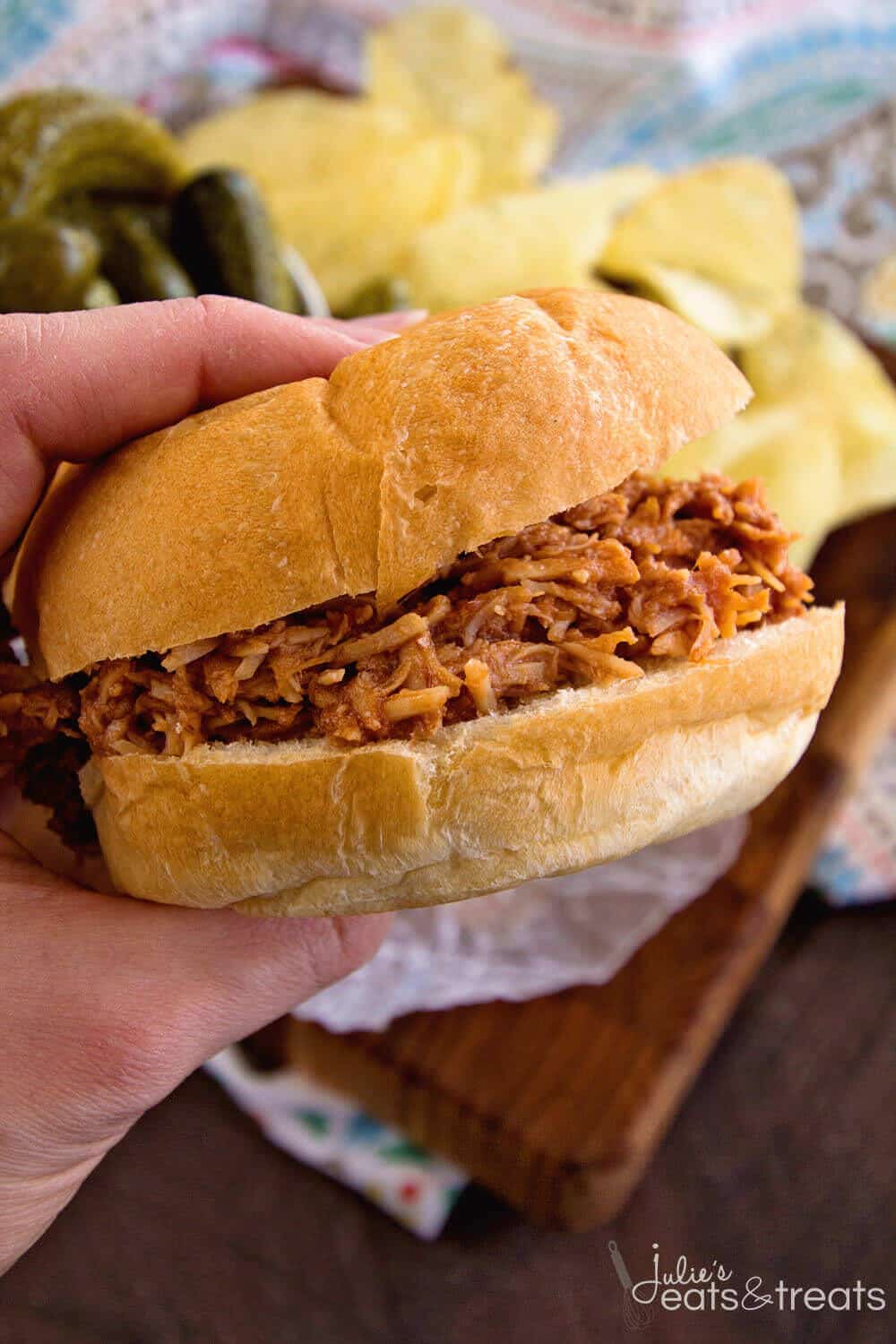 Crock Pot Smokey BBQ Shredded Chicken Sandwiches~ Easy, Shredded Chicken Sandwiches in Your Slow Cooker! Tender, Moist and Delicious Flavored with Liquid Smoke and Smothered in Barbecue Sauce!