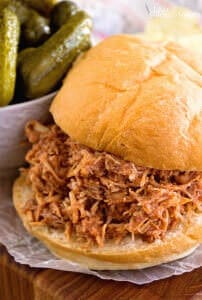 Crock Pot Smokey BBQ Shredded Chicken Sandwiches~ Easy, Shredded Chicken Sandwiches in Your Slow Cooker! Tender, Moist and Delicious Flavored with Liquid Smoke and Smothered in Barbecue Sauce!