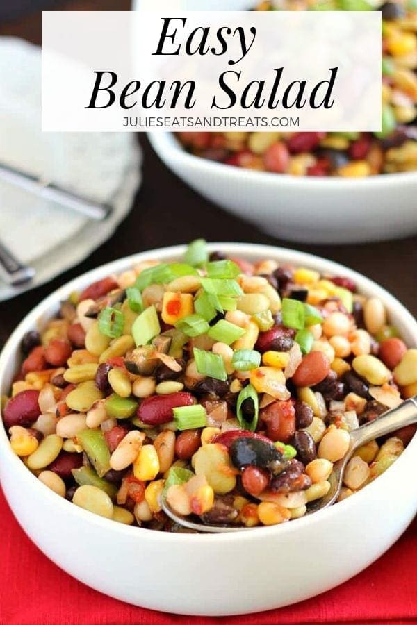 Easy bean salad in a white bowl with a spoon