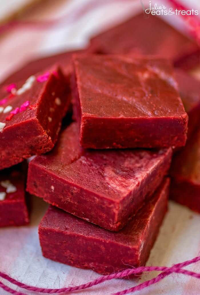 Red Velvet Fudge - This super easy fudge comes together in minutes and just melts in your mouth! It's the perfect addition to your Valentine's Day dessert spread.