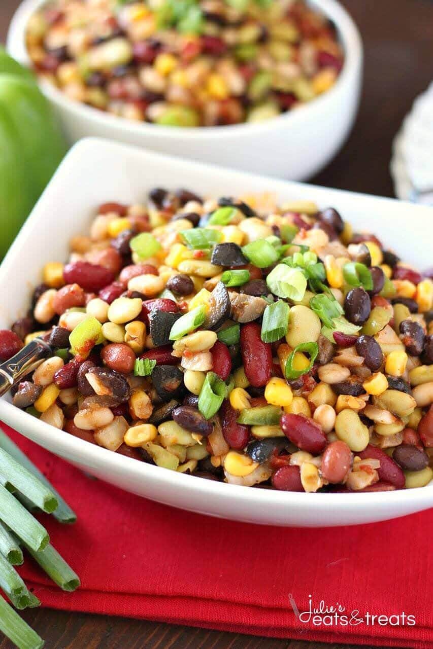 Colorful Bean Salad - A delicious array of flavors and beans brings this side dish to a whole new level. Plus it's easy to throw together on a busy night!