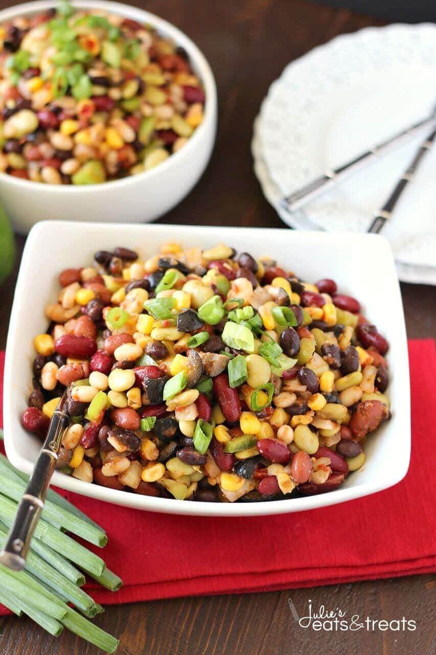 Colorful Bean Salad - A delicious array of flavors and beans brings this side dish to a whole new level. Plus it's easy to throw together on a busy night!
