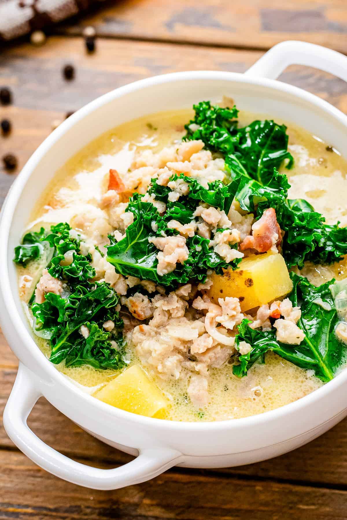 White bowl with Crock Pot Zuppa Toscana