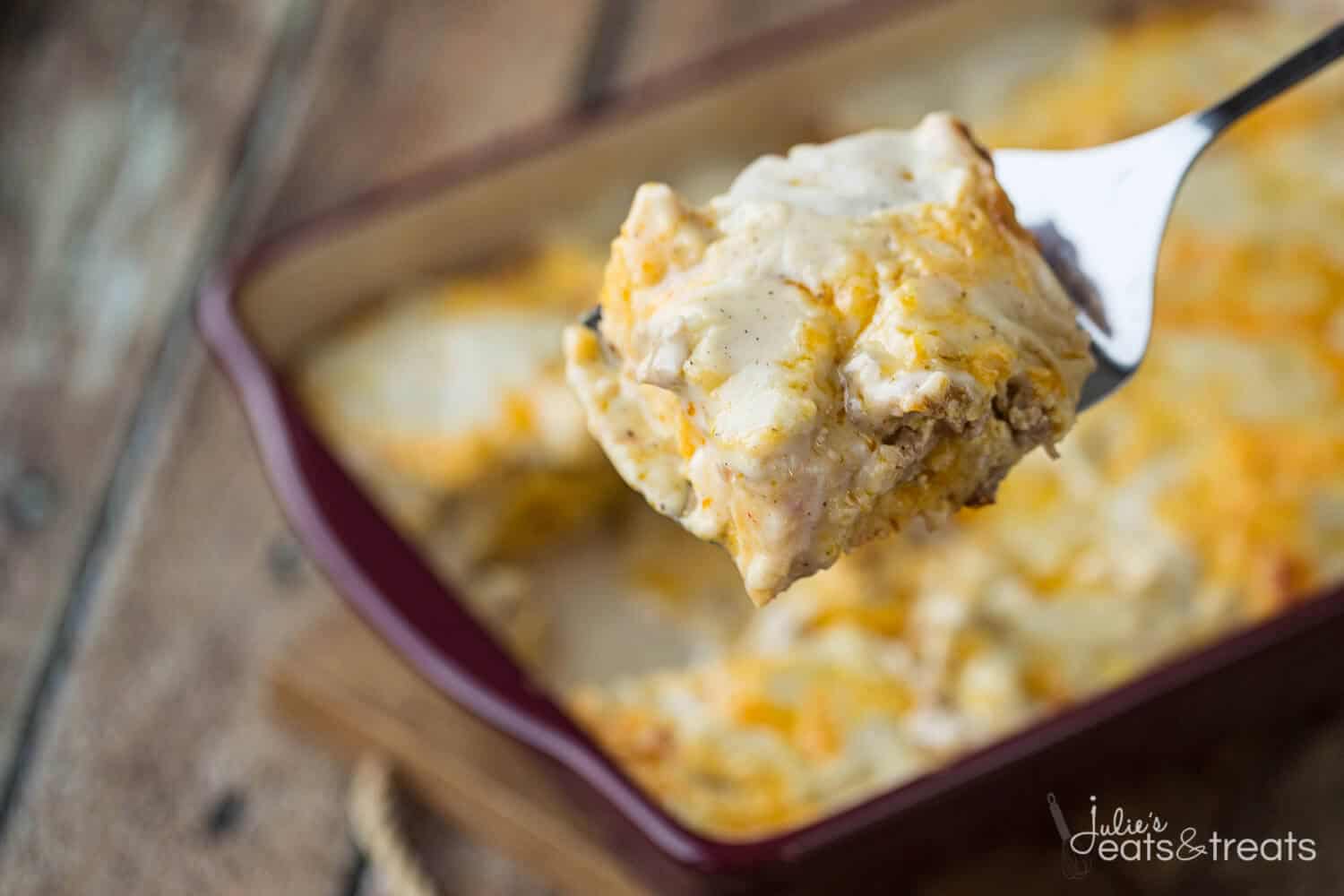 Biscuits and Gravy Overnight Breakfast Casserole ~ Comforting, Hearty Breakfast Casserole That is Prepared the Night Before and Baked in the Morning! Biscuits Loaded with Gravy, Sausage, Eggs and Cheese!