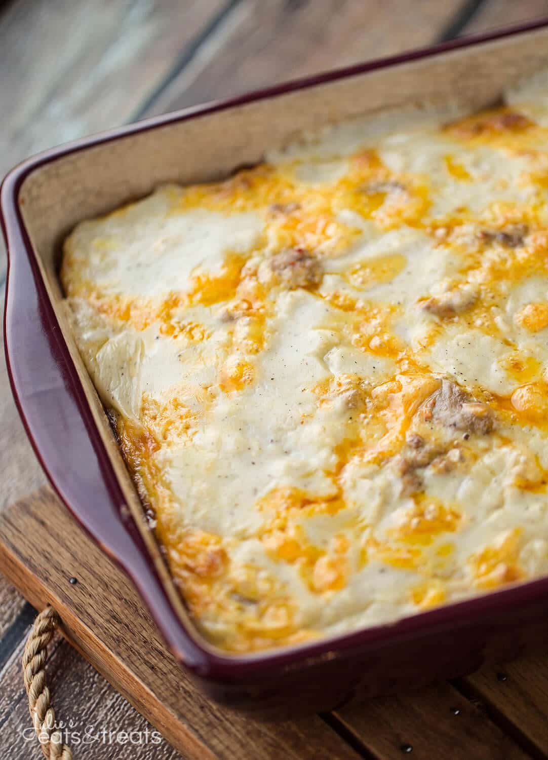 Biscuits and Gravy Overnight Breakfast Casserole ~ Comforting, Hearty Breakfast Casserole That is Prepared the Night Before and Baked in the Morning! Biscuits Loaded with Gravy, Sausage, Eggs and Cheese!