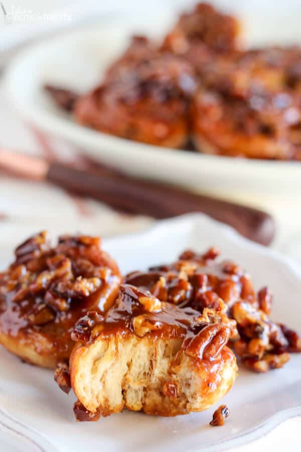 Easy Caramel Pecan Sticky Buns ~ Tender and gooey melt-in-your-mouth sticky buns topped with caramel sauce and chopped pecans. This easy recipe uses canned crescent roll dough and prepared caramel sauce!