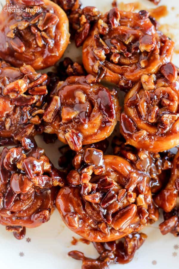 Easy Caramel Pecan Sticky Buns ~ Tender and gooey melt-in-your-mouth sticky buns topped with caramel sauce and chopped pecans. This easy recipe uses canned crescent roll dough and prepared caramel sauce!