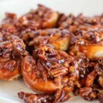 Easy caramel pecan sticky buns on a white plate