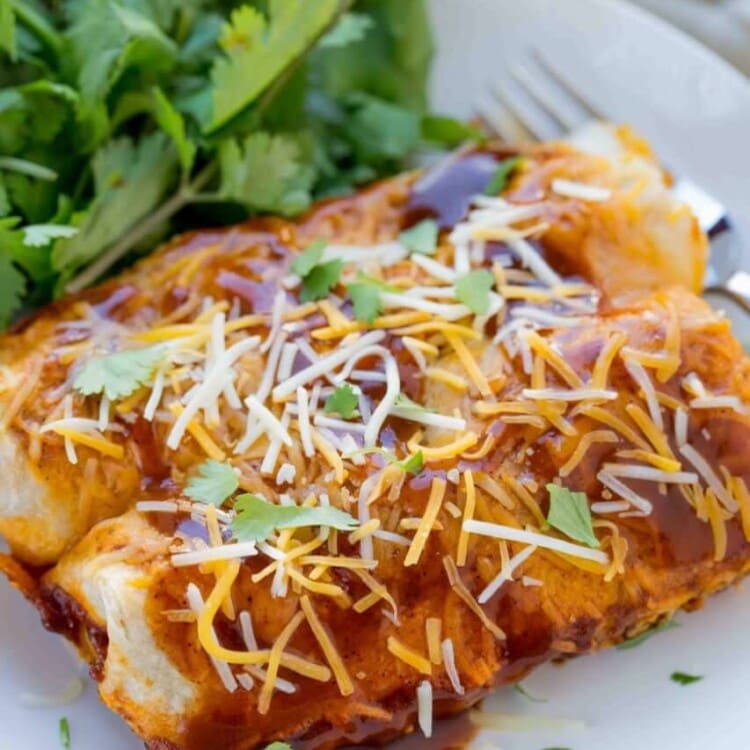 Beef & Potato Enchiladas ~ Loaded with delicious ground beef, crispy potatoes, vegetables then layered in a yummy enchilada sauce! The Perfect Weeknight Easy Dinner Recipe!