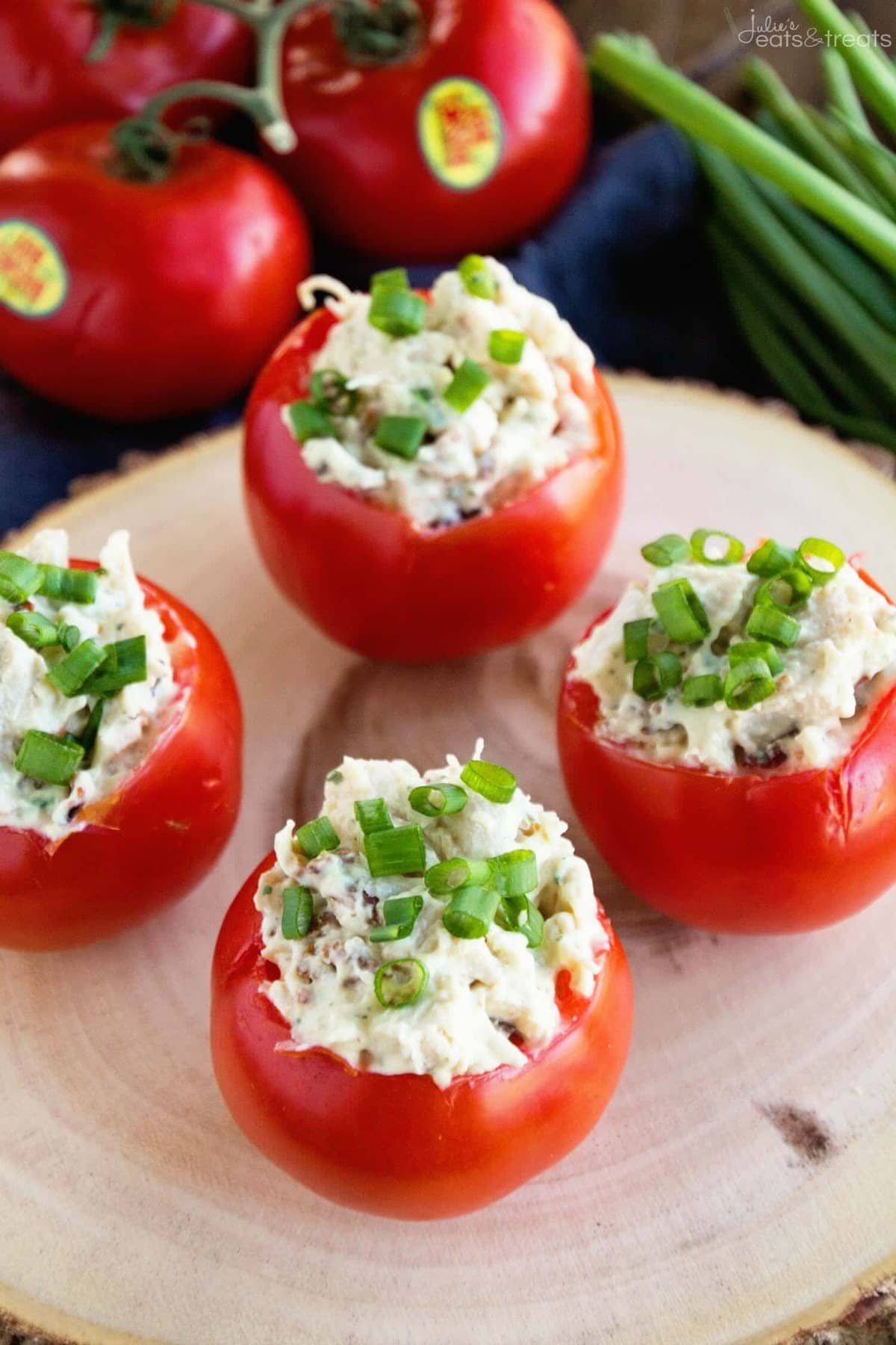 Stuffed Tomatoes on wood platter