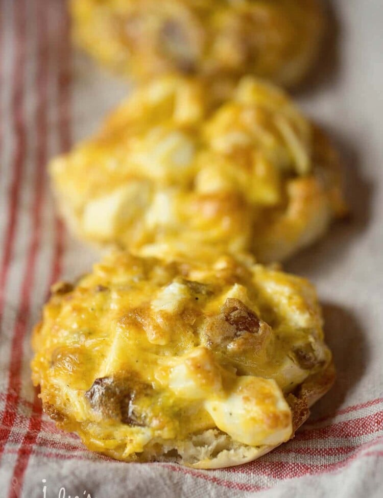 Make-Ahead Breakfast Muffin Melts ~ Melted Cheese, Warm Eggs and Bacon Piled on an English Muffin! Make Them Ahead, Warm Up and it's the Perfect Grab and Go Breakfast for on the Run!