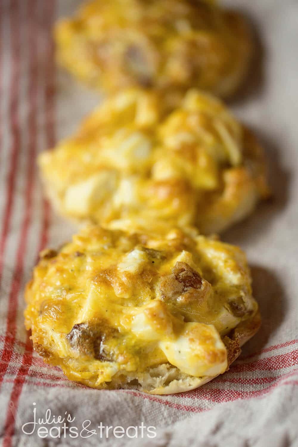 Make-Ahead Breakfast Muffin Melts ~ Melted Cheese, Warm Eggs and Bacon Piled on an English Muffin! Make Them Ahead, Warm Up and it's the Perfect Grab and Go Breakfast for on the Run!