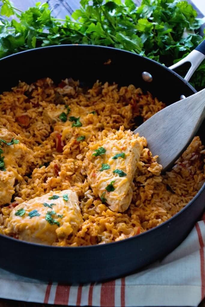 One Pot Fiesta Chicken & Rice Recipe ~ Quick, Easy One Pot Dinner with a Southwestern Flair! Cheesy Chicken In a Bed of Southwestern Rice Makes the Perfect Quick Meal!