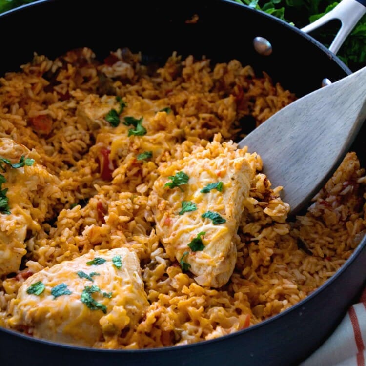 One Pot Fiesta Chicken & Rice Recipe ~ Quick, Easy One Pot Dinner with a Southwestern Flair! Cheesy Chicken In a Bed of Southwestern Rice Makes the Perfect Quick Meal!
